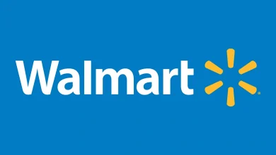 Logo de Walmart avec le mot "Walmart" en blanc sur fond bleu, accompagné de l'icône en forme d'étincelle jaune.